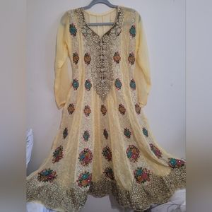 Yellow palistani a-line dress with beautiful gold and multicolor embroidery